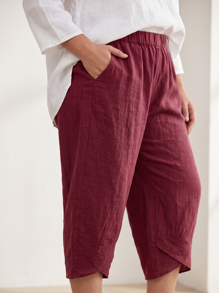 Close detail of the elasticated waistband and curved side seam