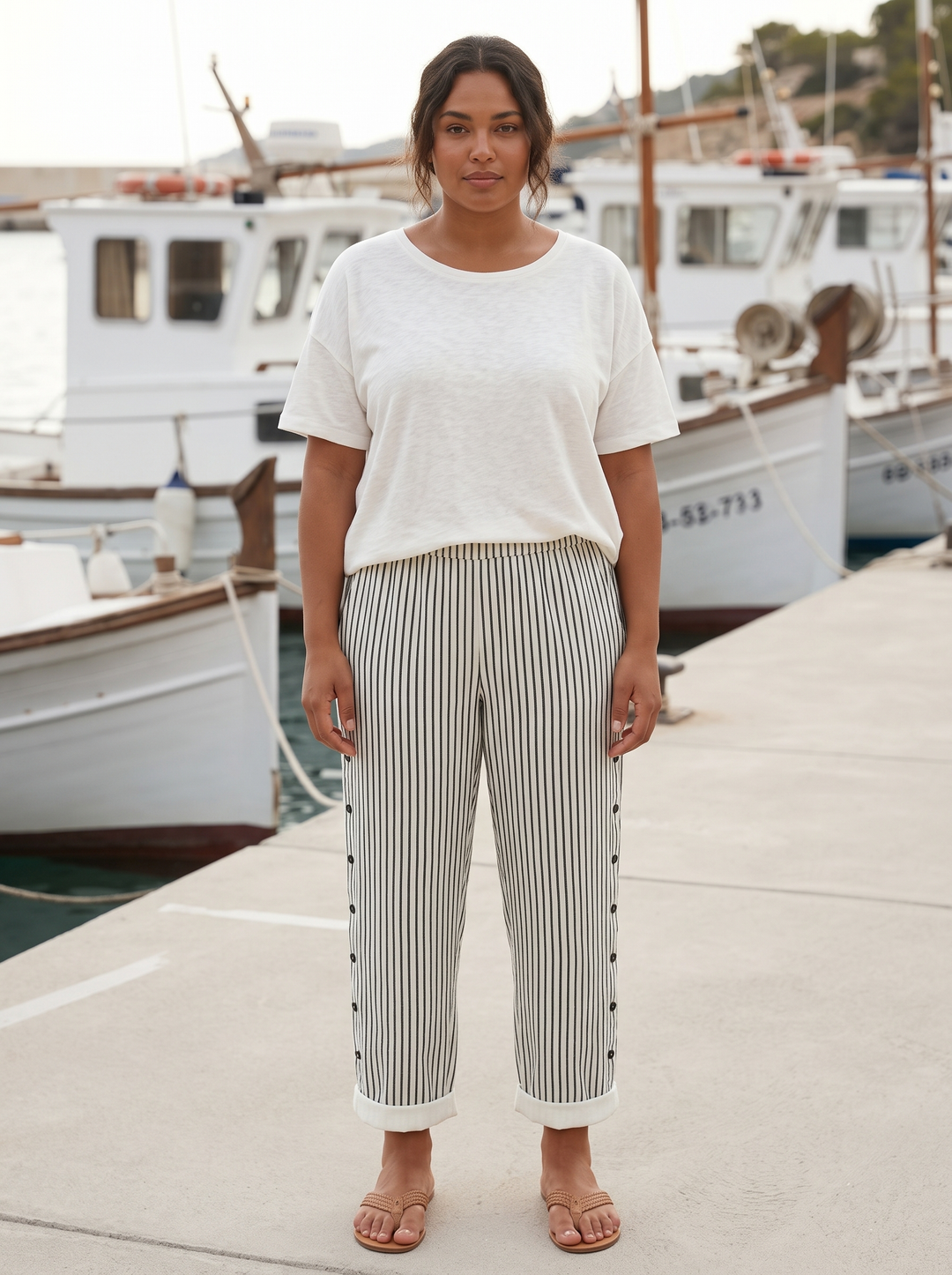 Black striped linen trousers with side seam buttons