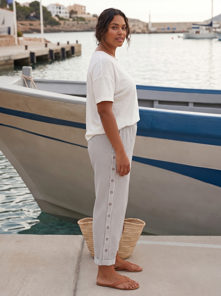 Grey striped linen trousers side view