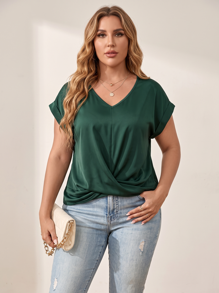 Green V-neck top with twist knot hem