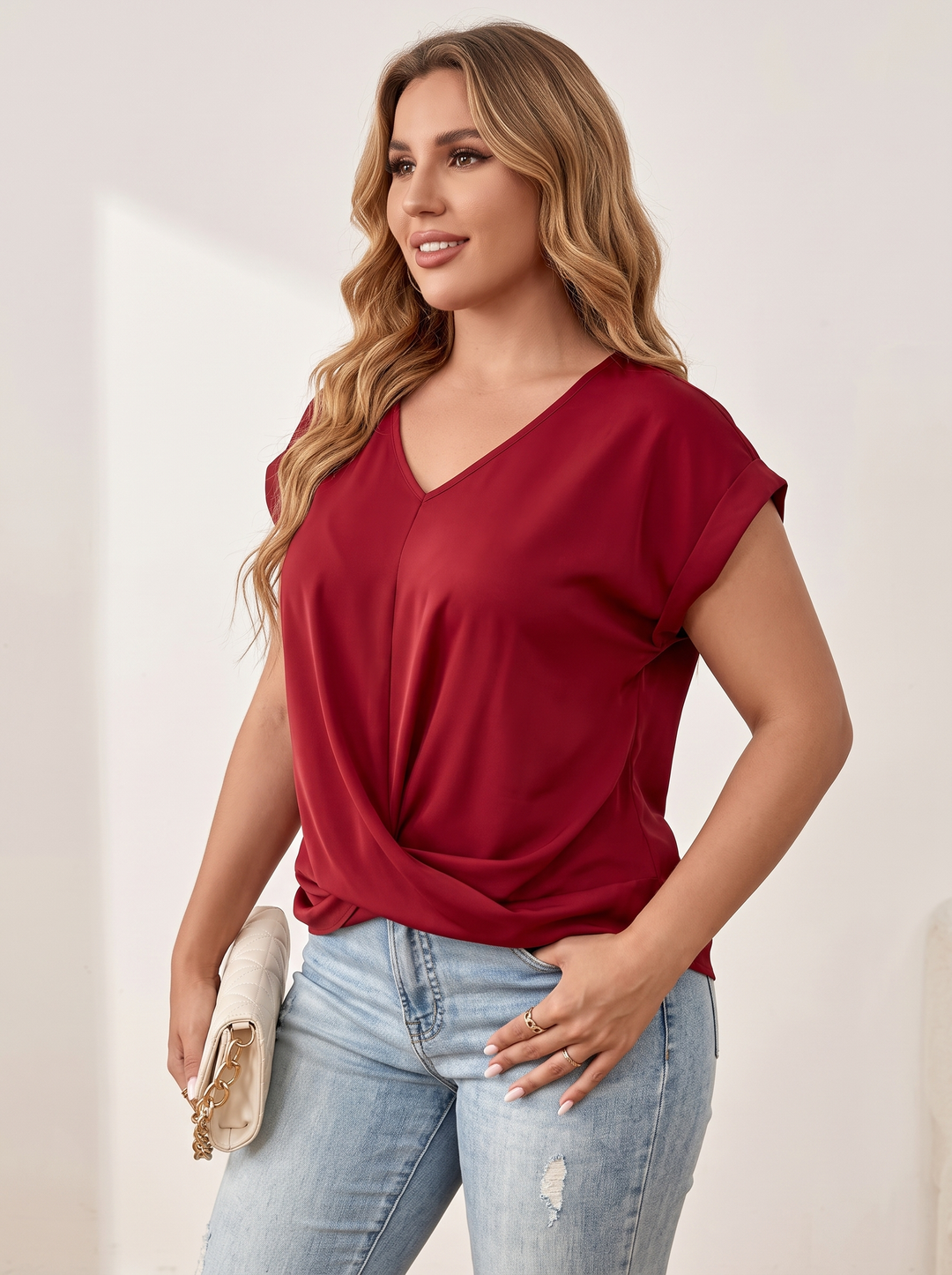 Red V-neck top with twist knot hem
