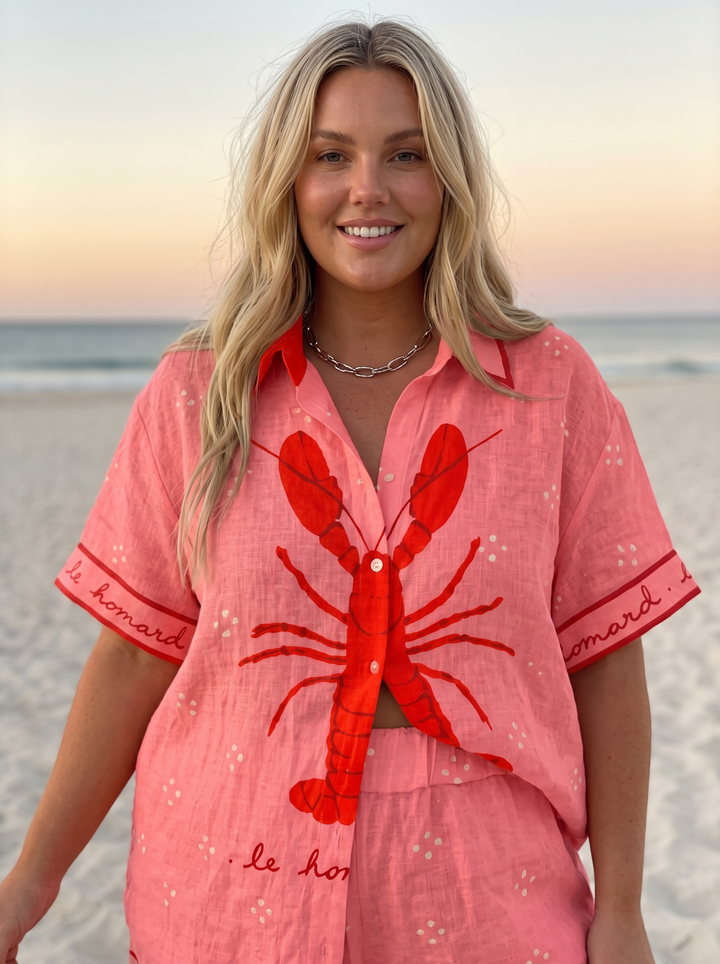 Close detail of the camp collar and lobster graphic