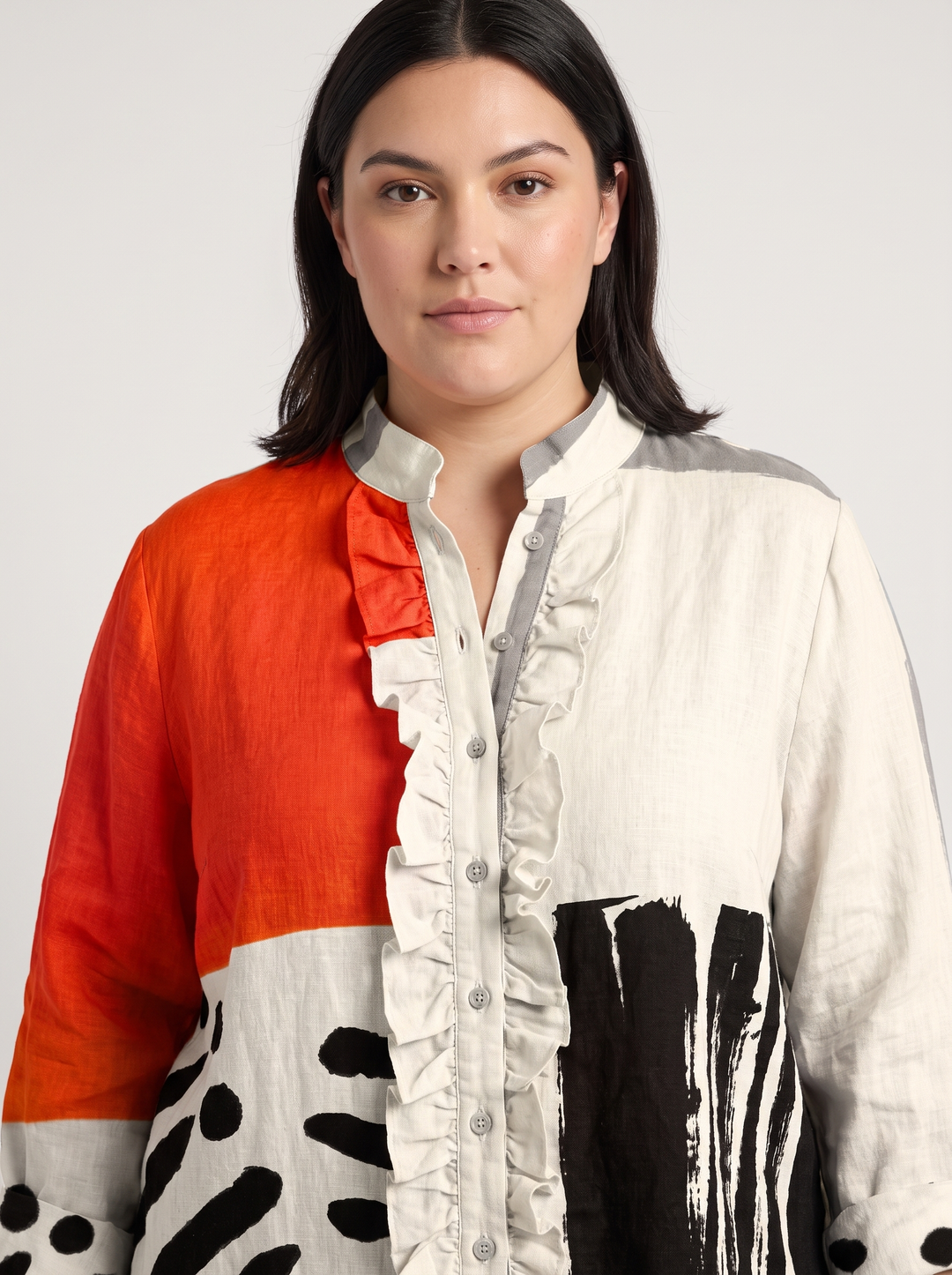 Close detail of the ruffle edged button placket