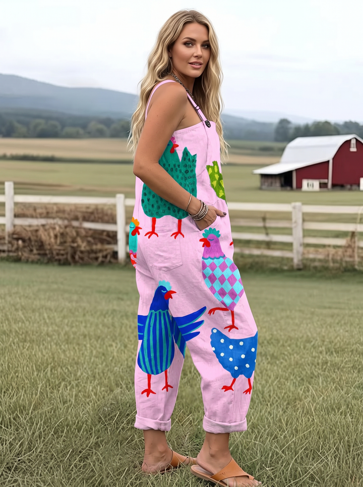 Pink rooster print jumpsuit three quarter view